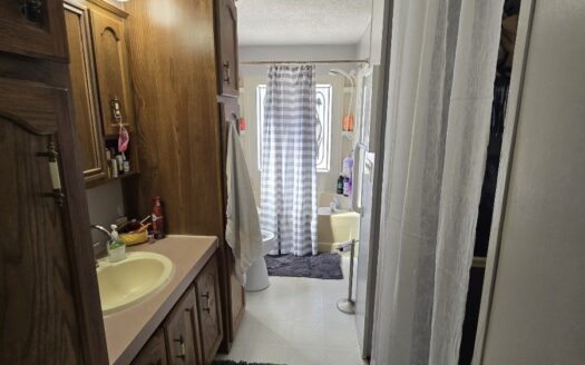 Corner Lot! 3 Bedrooms PLUS a Den! Covered Deck! Ramp! ManyUpdates!