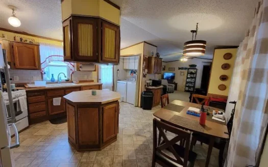 Absolutely Loaded! Upgrades Galore! Huge Covered Deck!