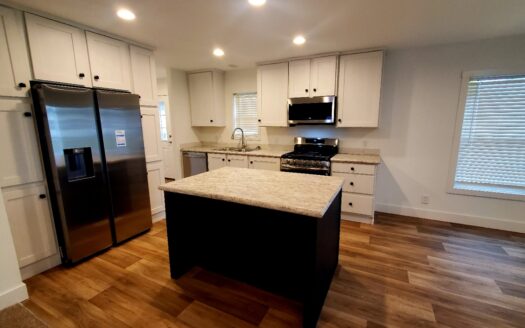 Absolutely Stunning! Huge Built on Covered Porch! 12 Months of Free Lot Rent!