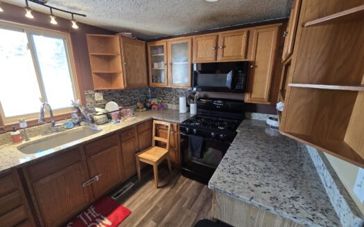 4 Bedrooms! Huge Deck! Updates Galore!