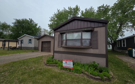 Well Maintained! Large Yard! Matching Shed AND Garage!