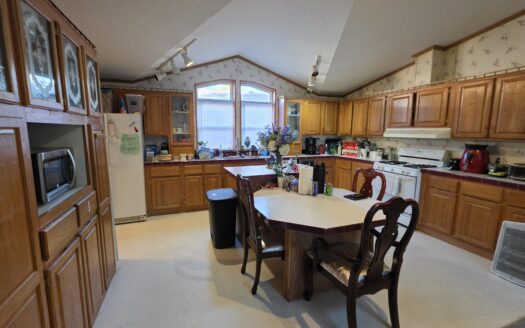 Absolutely loaded! Living AND Family Room w/ Fireplace in Between!